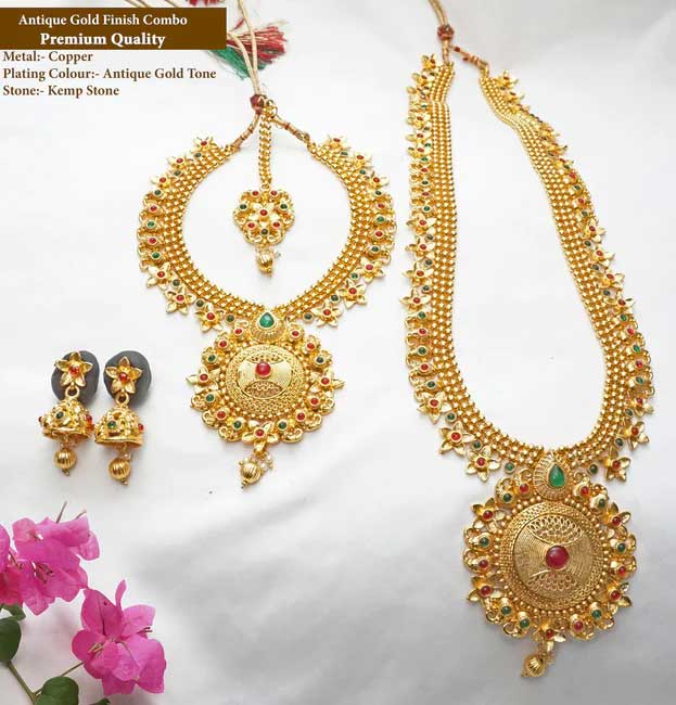 This haram set has a unique design that ties it to its true Indian roots. It has the glorious shine of kempu stone and the special Bandhai stone that come together beautifully with the antique plating.

Stand out from the crowd whenever you wear it, everywhere you wear it. Its unique design and a beautiful structure make it extra special. Its a must-have in every jewel box.

Product Details
The total length of the Short necklace is 8 Inches (4 inches on both sides).
The total length of the long necklace is 18 Inches (9 inches on both sides).
The height of the earrings is  2.5 cm and the width is  1.5 cm.
Necklace back site adjustable rope is attached.
Earrings lock is a press type.
100% made with love in India
We manufacture, design, and sell all of our jewelry.