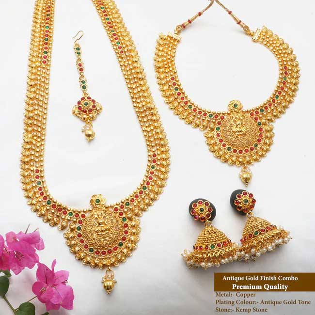 This haram set has a unique design that ties it to its true Indian roots. It has the glorious shine of kempu stone and the special Bandhai stone that come together beautifully with the antique plating.

Stand out from the crowd whenever you wear it, everywhere you wear it. Its unique design and a beautiful structure make it extra special. Its a must-have in every jewel box.

Product Details
The total length of the Short necklace is 8 Inches (4 inches on both sides).
The total length of the long necklace is 18 Inches (9 inches on both sides).
The height of the earrings is  2.5 cm and the width is  1.5 cm.
Necklace back site adjustable rope is attached.
Earrings lock is a press type.
100% made with love in India
We manufacture, design, and sell all of our jewelry.