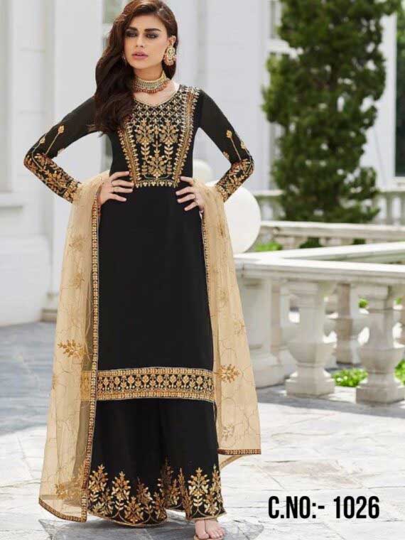 Introducing our latest collection of Pakistani Designer Salwar Suits, perfect for the modern-day woman who loves to make a statement. Our Black Simple Partywear Salwar Kameez is a beautiful ensemble that exudes sophistication and style. The outfit features a black raw georgette fabric that adds a touch of elegance to the ensemble. The semi-stitched top and stitched palazzo pants provide maximum comfort and flexibility to the wearer.