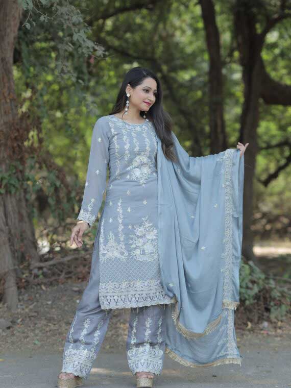Designer Grey Designer Embroidered work straight Salwar Suit has beautiful floral work. Bringing to your Own the ultimate party look collection straight out from the heart of Shampysky. The outfit is fabricated in raw georgette with embroidered border Dupatta. it is designed with full sleeves and drawstring closure. semi-stitched top and palazzo are very suitable for you. you can stitch easily with your perfect size and Impress others at parties and functions. Stylish neck with an embroidered long kurta set and matching santoon fabric bottom. Blue full work dress is comfortable and versatile, making you a popular choice for Partywear. customization is available.