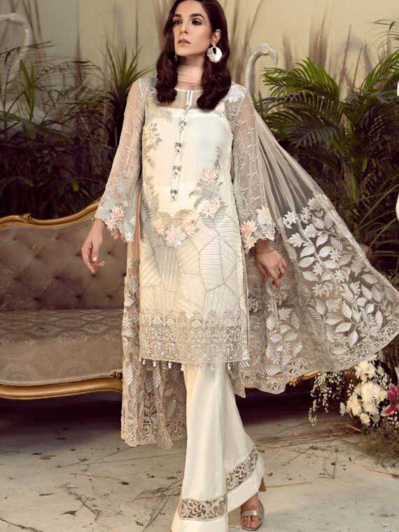 Introducing our stunning Designer Off-White Pakistani Style Salwar Suit, the perfect addition to your wardrobe for any party or wedding. This suit features beautiful floral work on raw georgette fabric, with intricate embroidery adding a touch of elegance to the outfit.