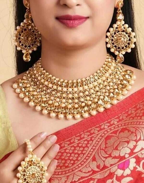 Base Metal: Alloy
Plating: Gold Plated
Stone Type: Cubic Zirconia/American Diamond
Sizing: Adjustable
Type: Choker and Earrings
Net Quantity (N): 1
Stylish choker necklace set for women Antique gold plated crystal kundan jewellery set with earrings
Country of Origin: India