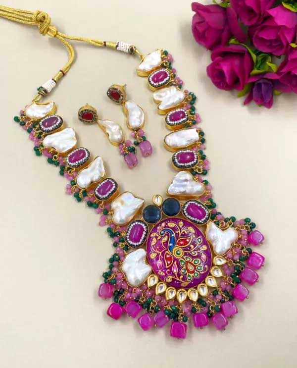 Modern handcrafted gold plated Baroque pearls and Kundan statement necklace set from the house of the Gehna Shop.