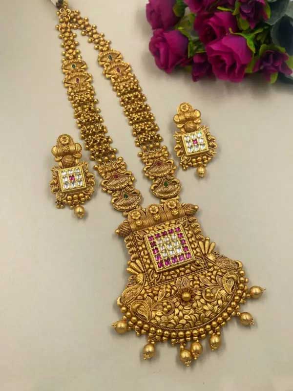 Traditional gold-plated latest golden long Necklace set from the house of the Gehna Shop.